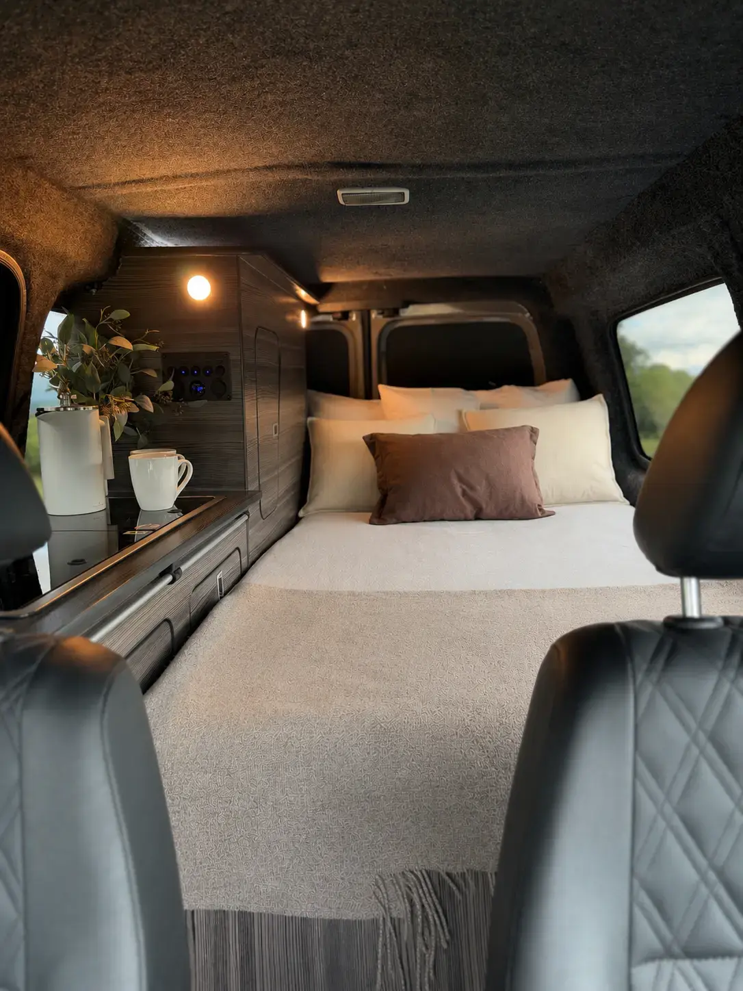 Genuine completed customer camper with the double bed fully made up